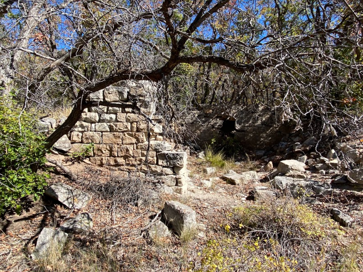 Image of old stone wall from original town of Perins, CO where train use to run.